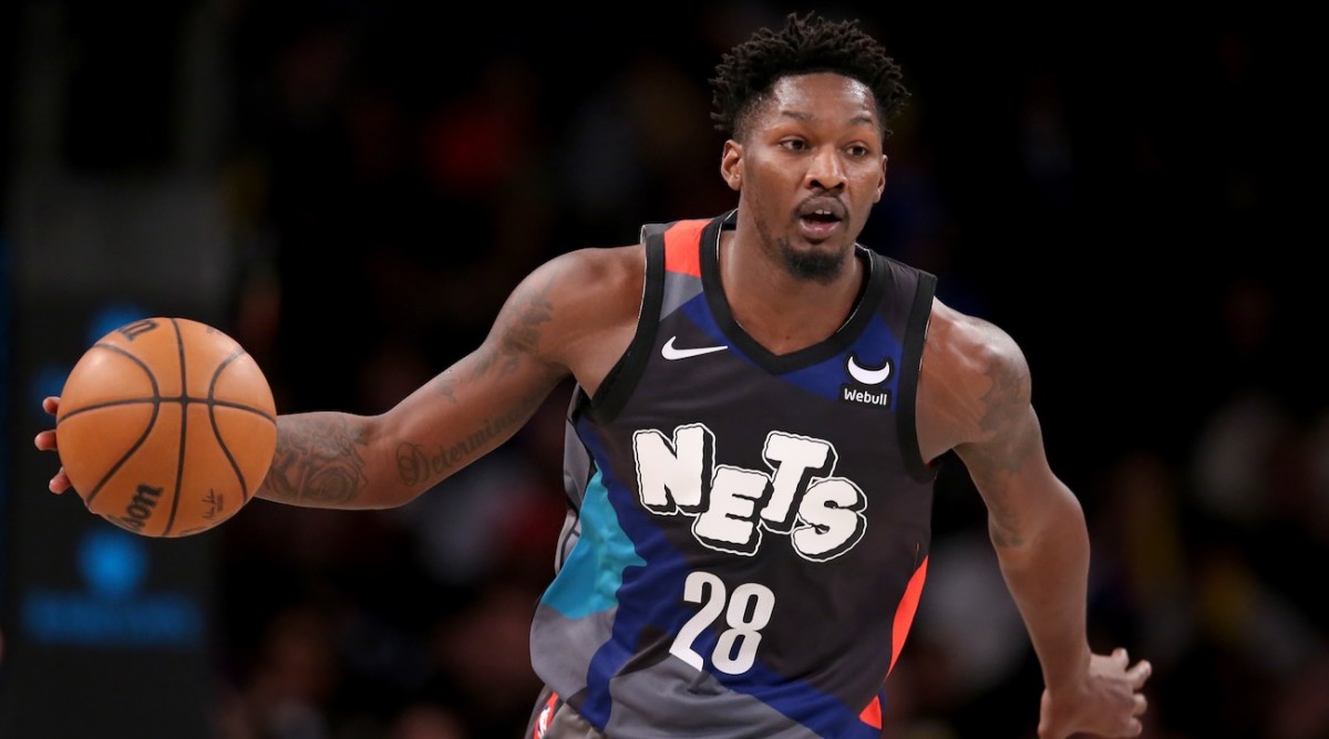 Brooklyn Nets forward Dorian Finney-Smith brings the ball up court against the New York Knicks during the fourth quarter at Barclays Center in New York City on Dec 20, 2023.